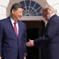 Image 7: President Donald Trump, right, greets China's President Xi Jinping