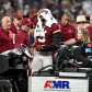 Image 11: Trainers attend to Jayden Daniels.